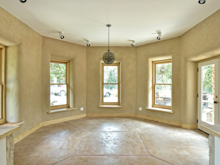 Custom Home Projects 38 Curved-Living-Area-with-Large-Windows
