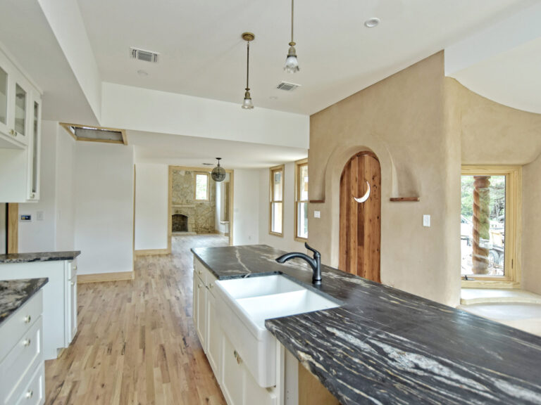 Custom Home Projects 42 Rustic-Kitchen-with-Dark-Stone-Countertop