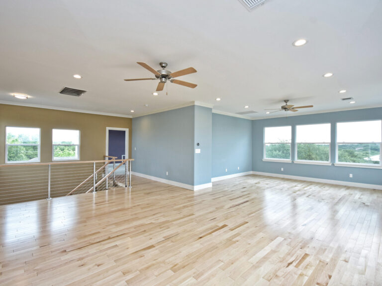 Remodeling Projects 30 Spacious-Living-Area-with-Hardwood-Floors